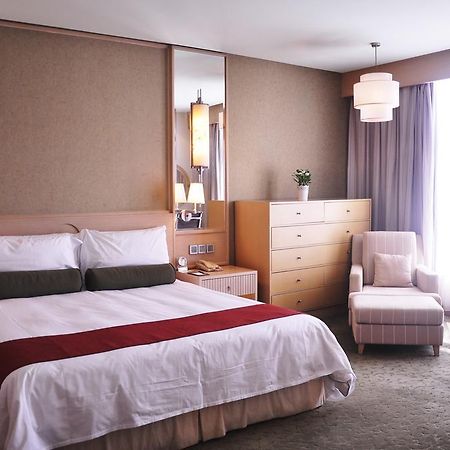 Hotel Nikko Tianjin Exterior foto A bedroom at the hotel