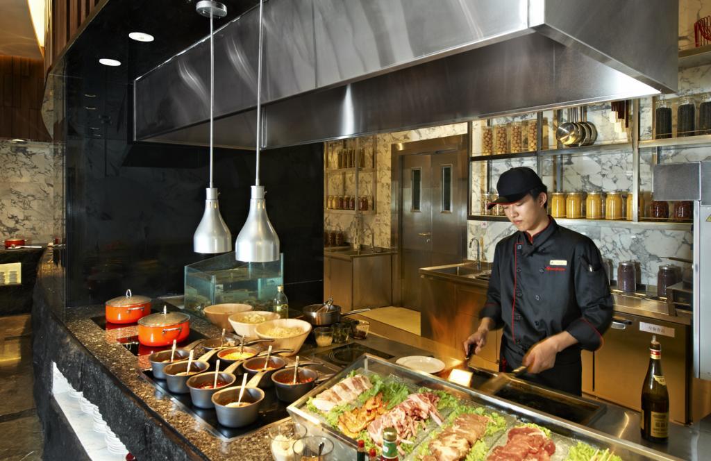 Hotel Nikko Tianjin Exterior foto A live kitchen at a hotel
