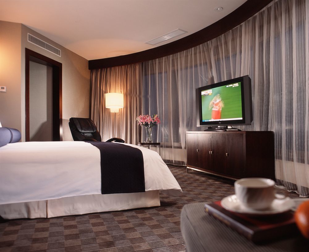 Hotel Nikko Tianjin Exterior foto A suite at the hotel