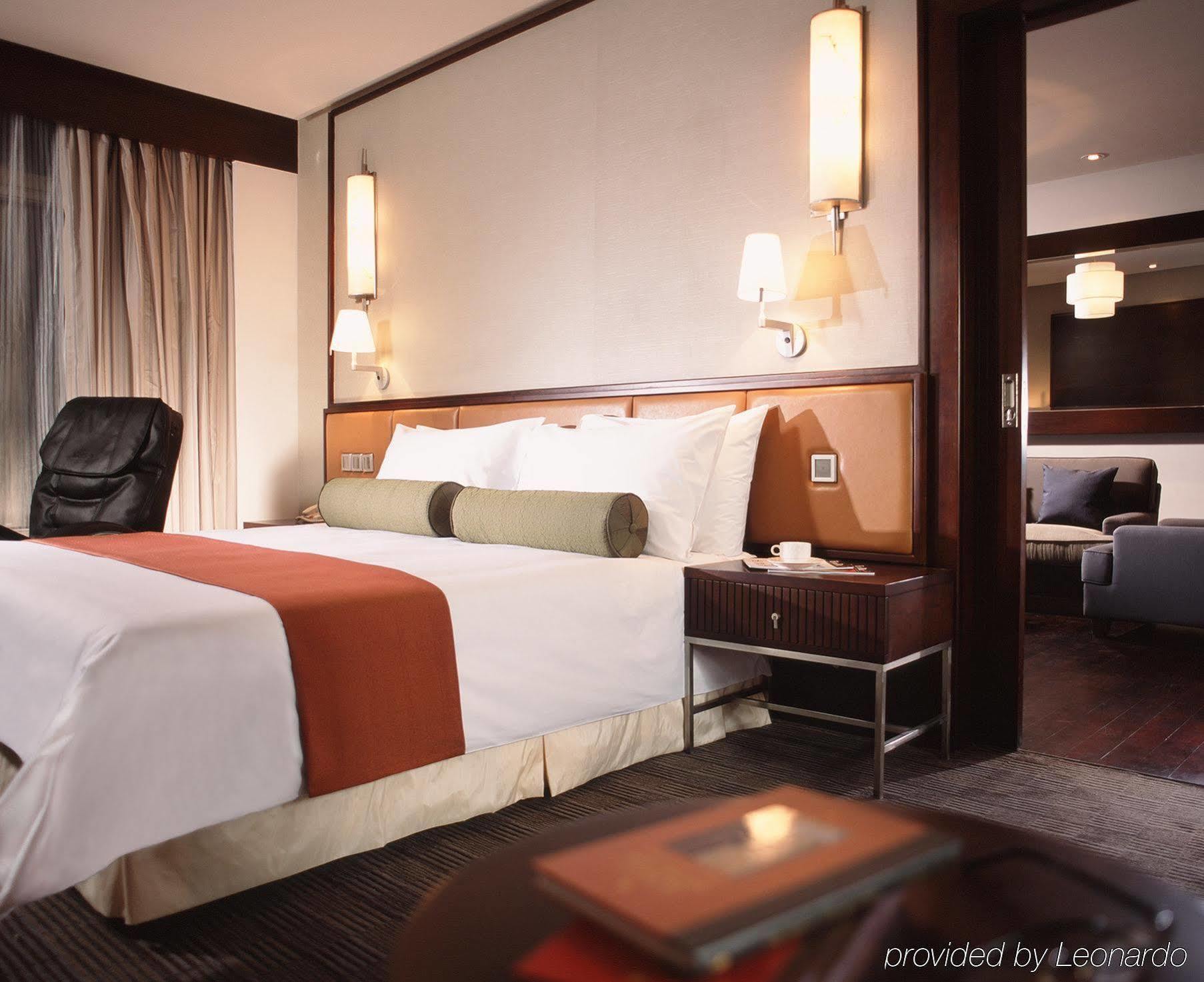 Hotel Nikko Tianjin Exterior foto A suite at the hotel
